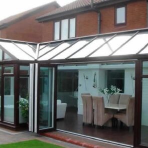 rosewood conservatory with bi-folding doors in Yorkshire