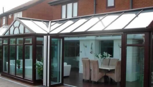 rosewood conservatory with bi-folding doors in Yorkshire